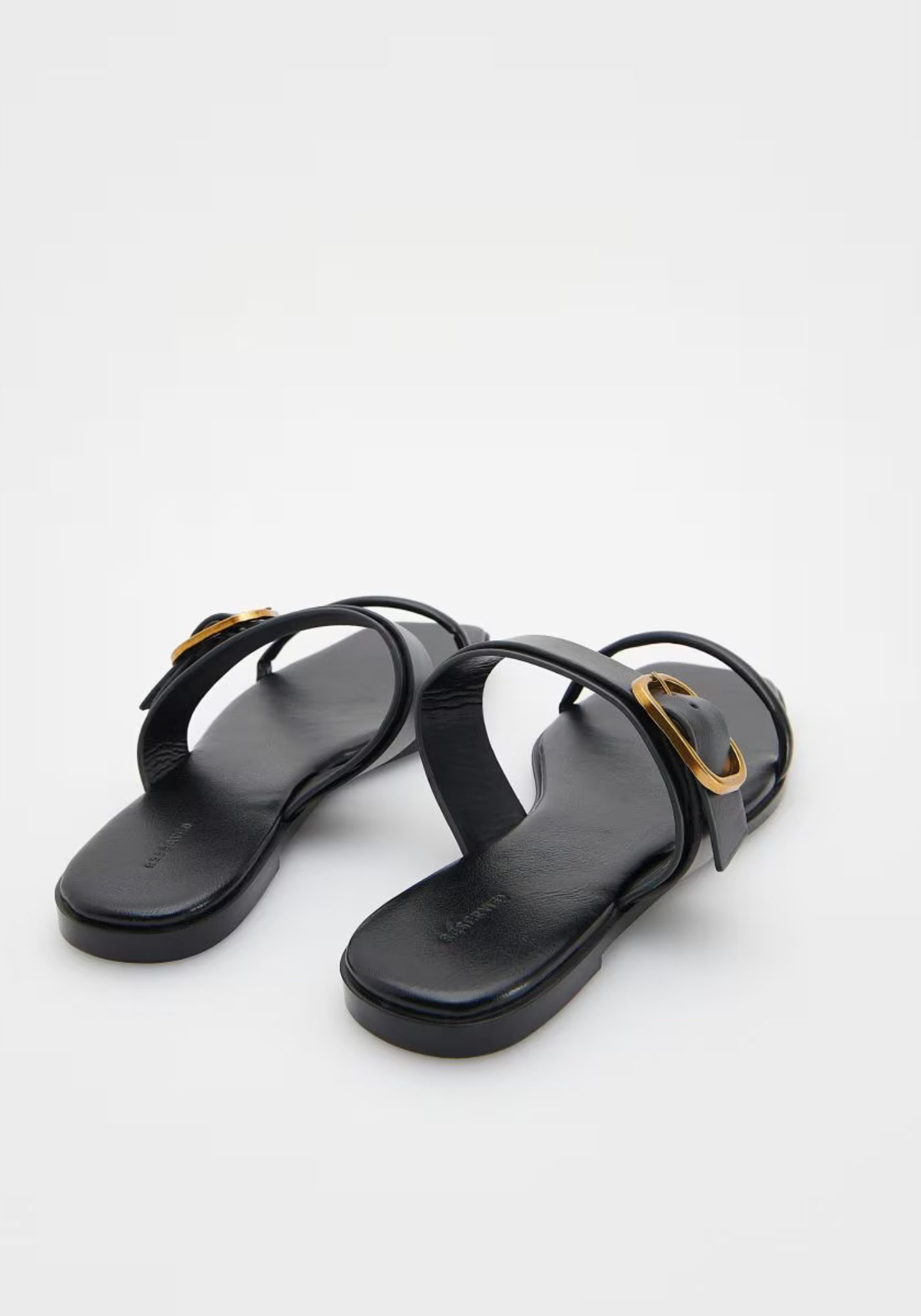 Mules en cuir à boucle