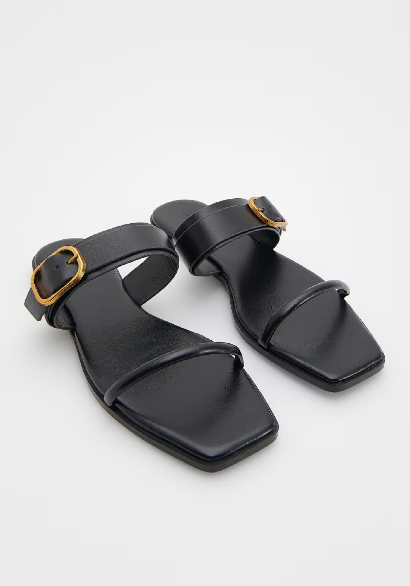 Mules en cuir à boucle